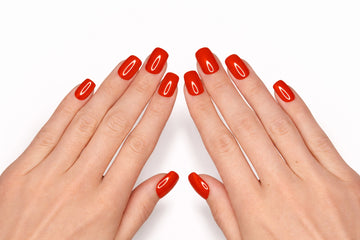 Manucure press-on Tangerine Glow rouge orangé vif — finition laquée ultra-brillante sur ongles extra-courts — Mimi Press-On